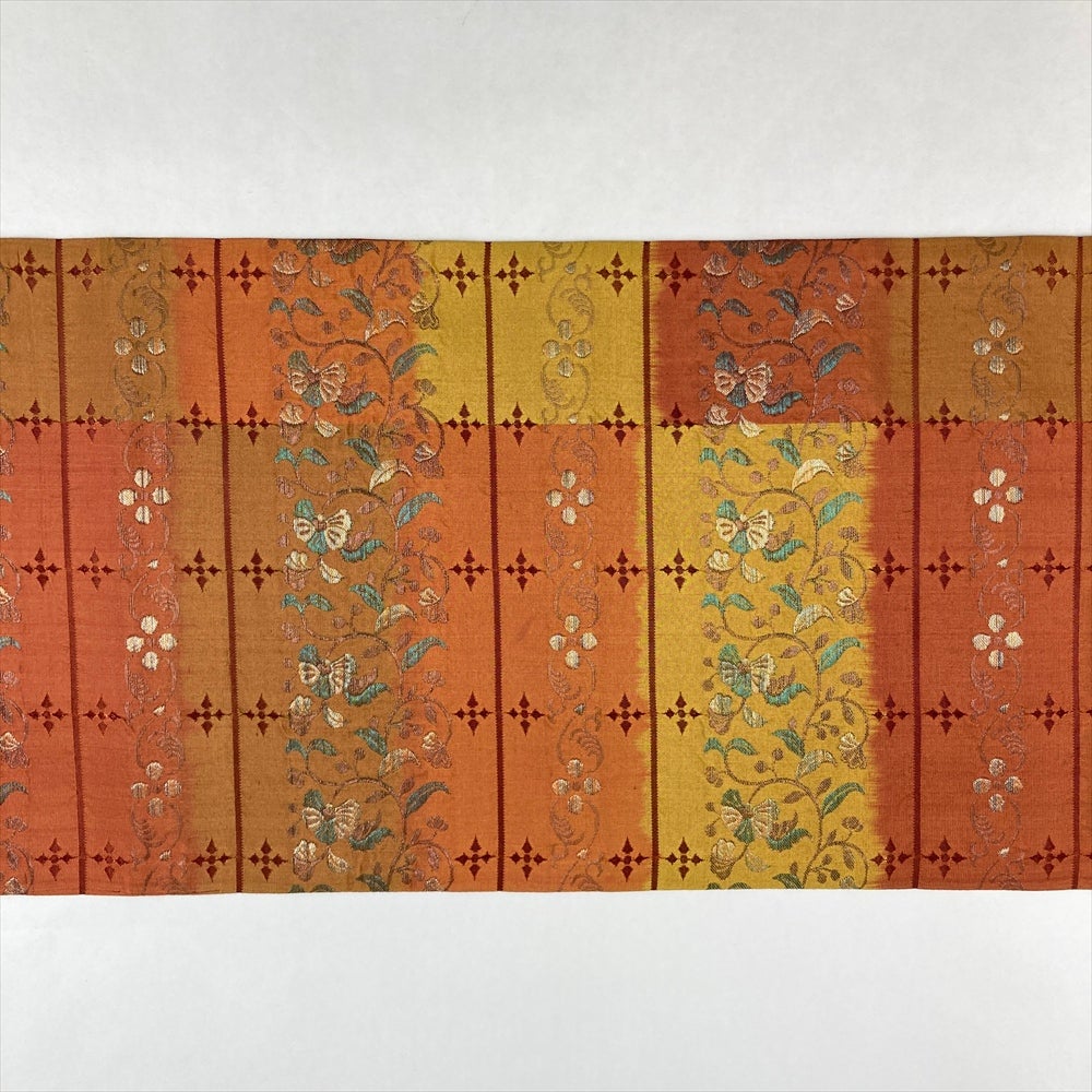 中古）袋帯 茶 オレンジ カジュアル 全通 織り 変わり市松 唐草花