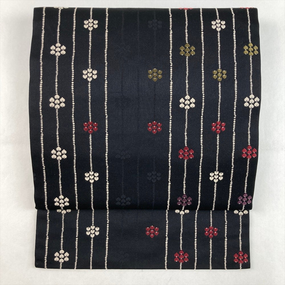 ☆中古品☆小物　単品　正絹　縞に花模様Ｂ級品汚れ有り小紋KM-045-25 中古）名古屋帯 黒 カジュアル 名古屋仕立て 織り 縦縞 小花 絹